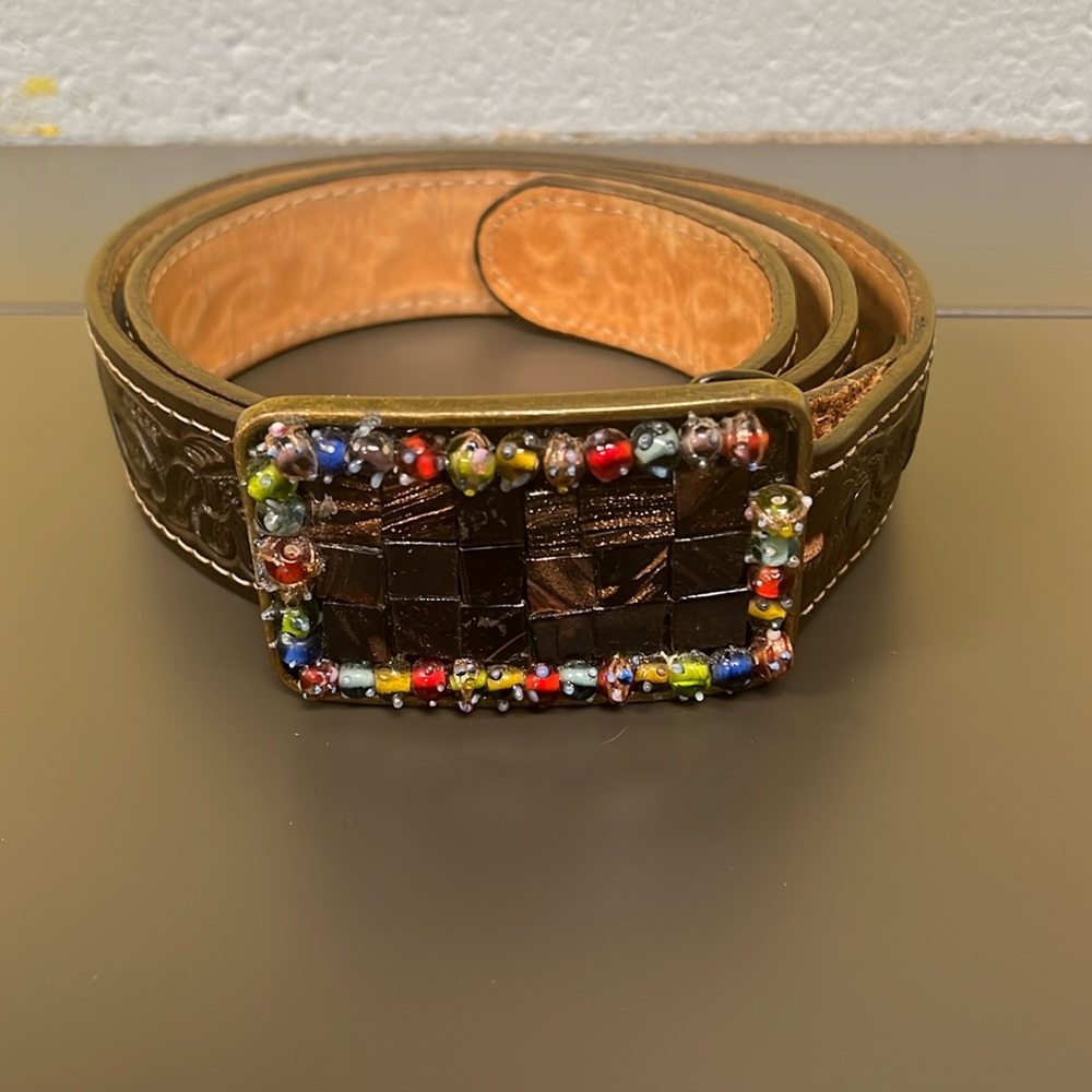 Western leather tooled belt with beaded buckle